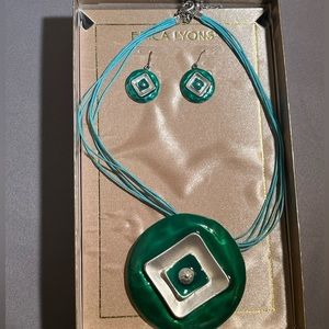 Green and silver Erica Lyons necklace and earring set.